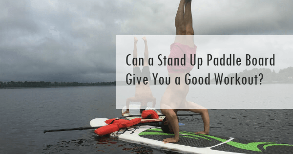 Two men doing SUP workouts