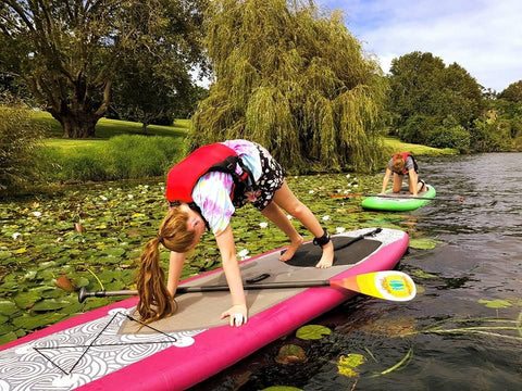 SUP Yoga on a river in New Zealand