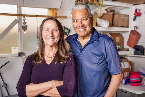 Photograph of Renee and Robert, co-founders of Here I Am in their workshop