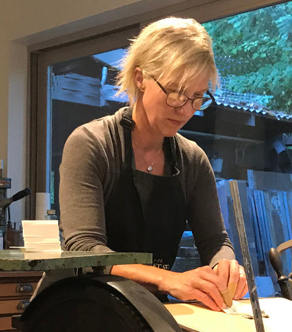 Jennifer Rich working the letterpress