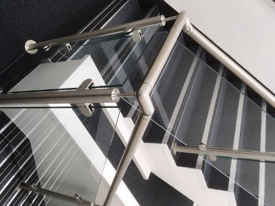 Glass balustrade on office staircase