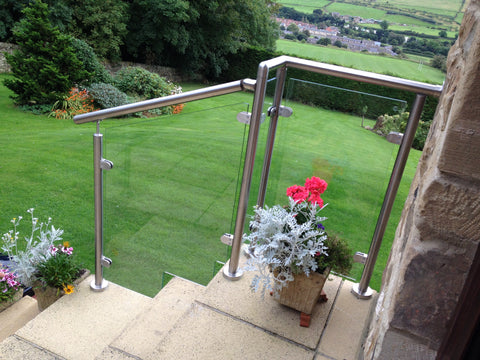 Shaped glass panel in glass balustrade 