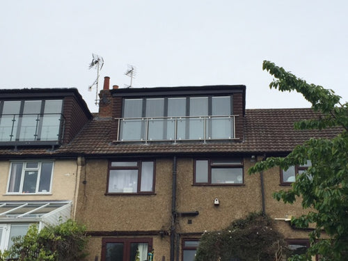 Stainless steel Juliette balcony with wire rails In private residence.