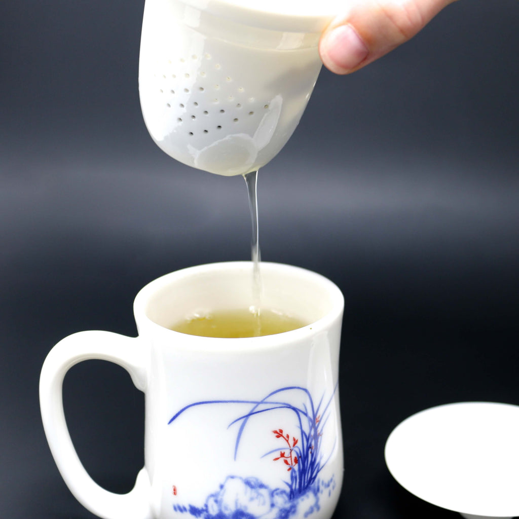 Tea steeping in the Jade Porcelain Tea Infuser Cup