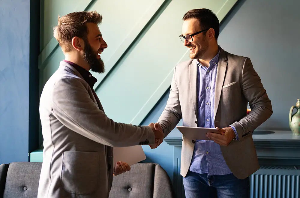 two men shaking hands