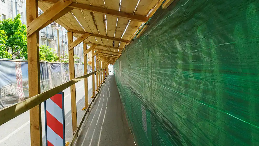 large fence screen on construction building