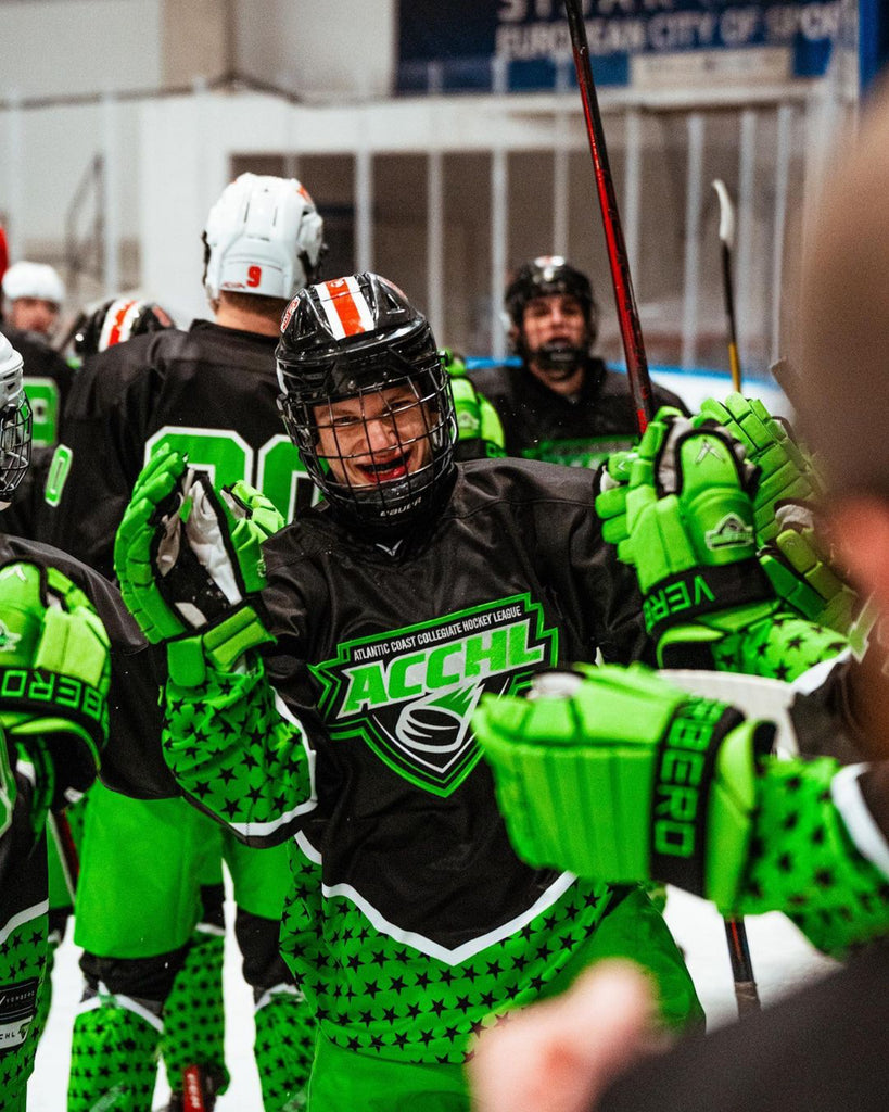 A hockey player celebrates a goal in his Custom Game Wear for ACCHL All Stars by Verbero