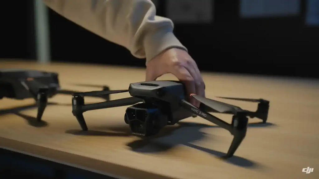 DJI Mavic Pro 3 drone being set on table