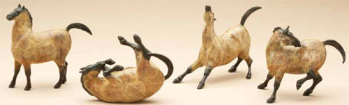 Star Liana York, mini bronze horses from Rock Art Mare collection, based on prehistoric drawings 