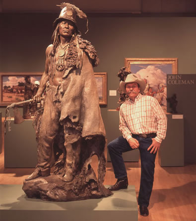 John Coleman with his sculpture, Explorer Artists Bodmer-Catlin Series: Addih-Hiddisch, Hidatsa Chief, Bronze Edition of 9, Available for sale at Mark Sublette Medicine Man Gallery