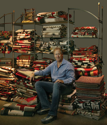 Dr. Mark Sublette, owner of Medicine Man Gallery, in the textile room at his gallery's Tucson, Arizona location. Photo by Meghann Eppstein