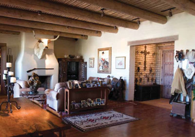 A view of the Fellows’ living room and front entryway from the kitchen.