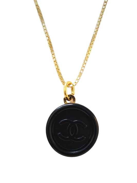 Chanel Button Pendant — 33 Jewels at El Paseo