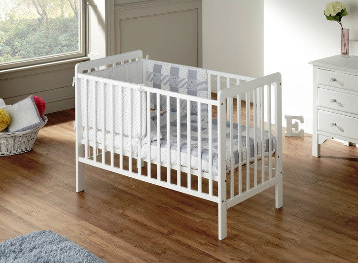 white wooden cot