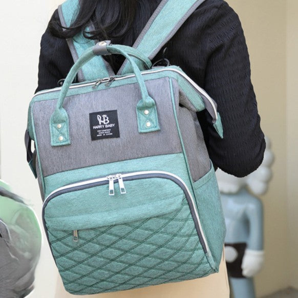 Sac à dos à langer vert maman