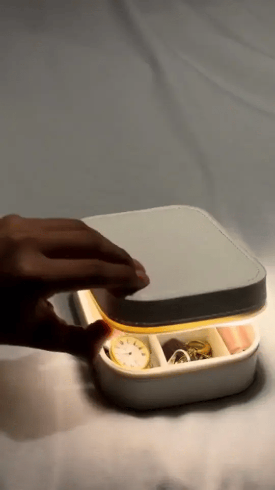 GlowBox opening in a dark room with LEDs illuminating