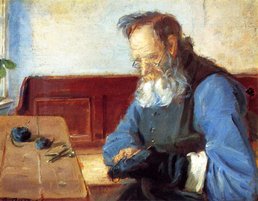 A Man Mending Socks