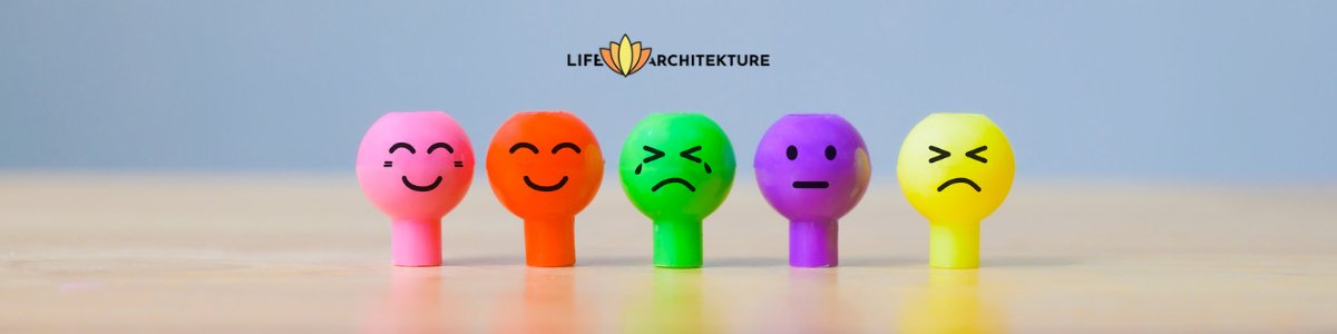 five colourful pins with different smiley emotions drawn on it