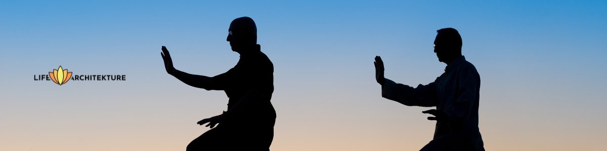 two men shadows practicing tai chi at sunrise