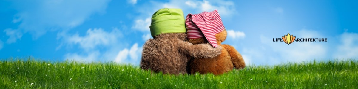 two teddy bears in a green field showing empathy and care