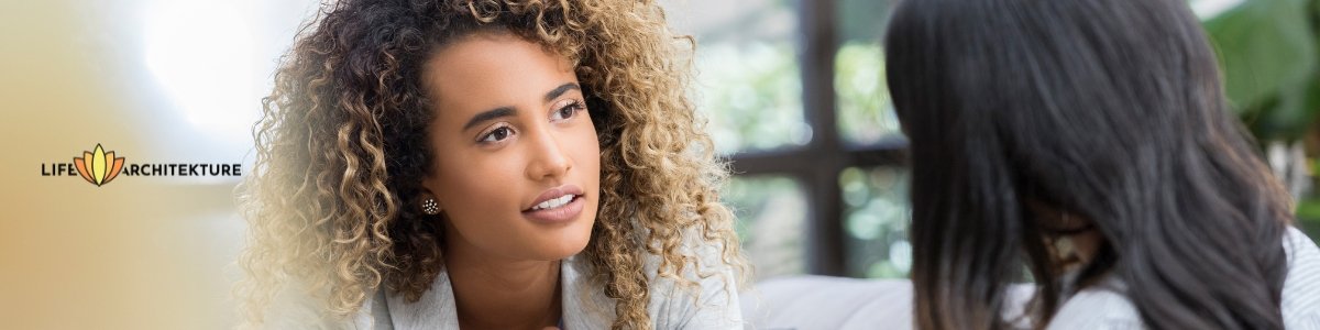 woman listening to another woman being vulnerable