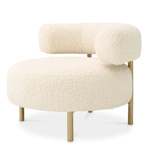 Chair Thompson
Faux shearling | brushed brass finish legs - Haus Of Tre Li