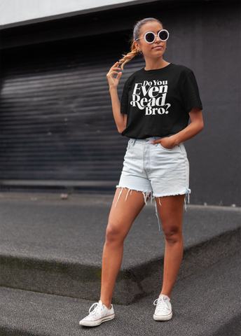 Cute model standing outside on the sidewalk wearing a black "DO You Even Read Bro?" tee