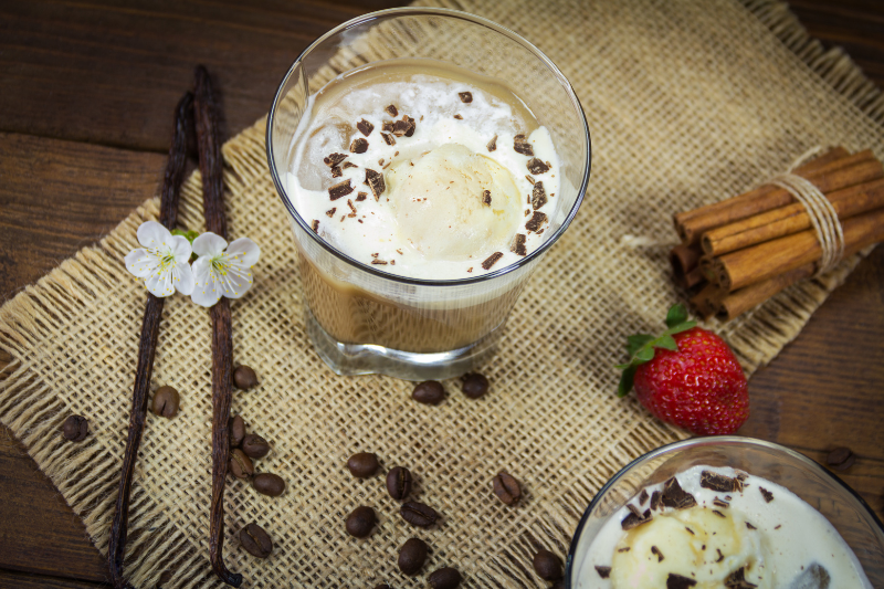 Two glasses of Ice coffe on wooden background