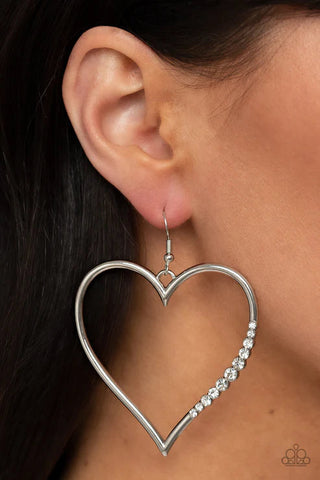Bewitched Kiss - A heart-shaped frame earring with fishhook fitting.