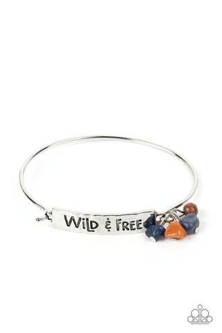 Image of "Fearless Fashionista - Blue" bracelet.  Inscribed with words "Wild & Free."
