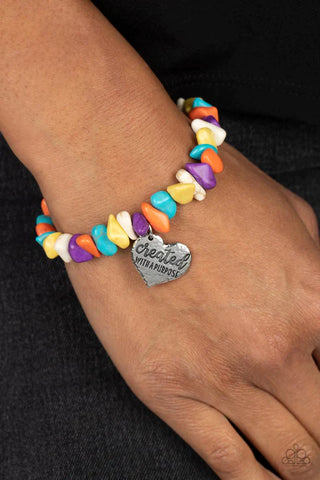 Image of Stony-Hearted Multi stretch bracelet.  Heart charm engraved with phrase "created with a purpose."