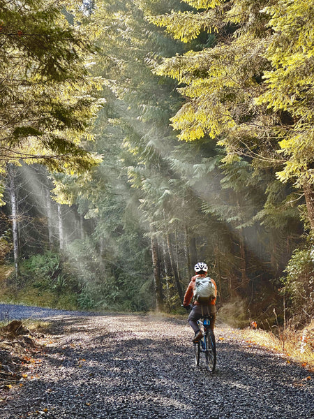 Kyle biking amongst fall foliage