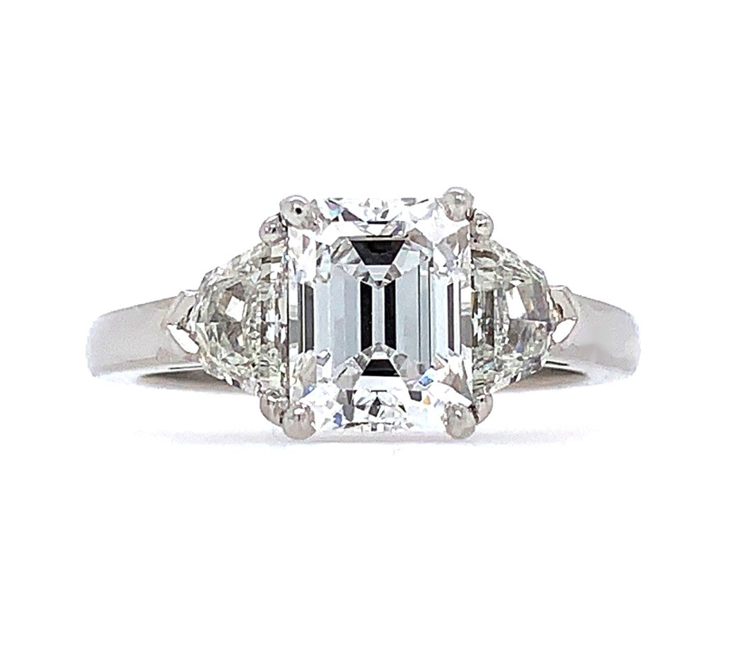 Three-Stone Ring with Emerald Center Diamond