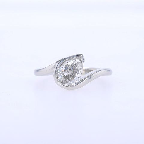 Jewelsmith ring with natural pear-shaped diamond