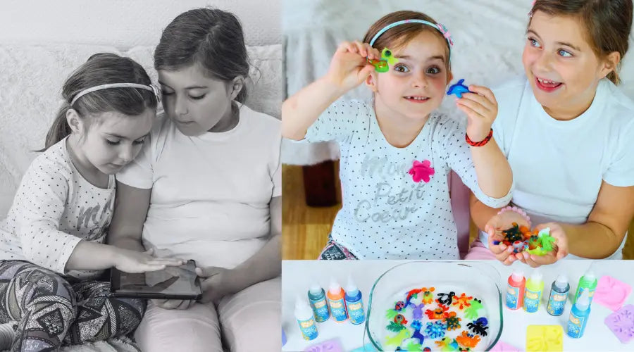 Two young girls using a tablet and playing with arts and crafts.