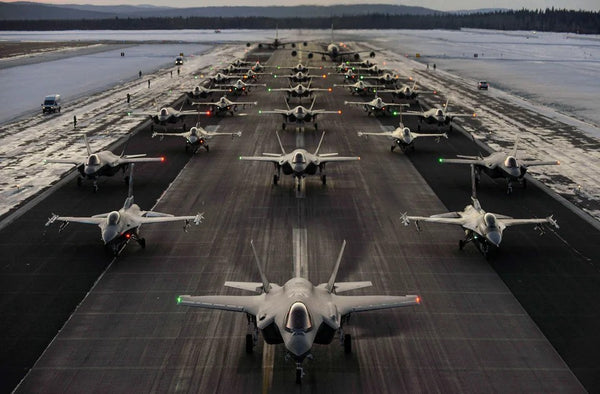 Air Force and Air National Guard aircraft line up in formation at Air Force Base in Alaska