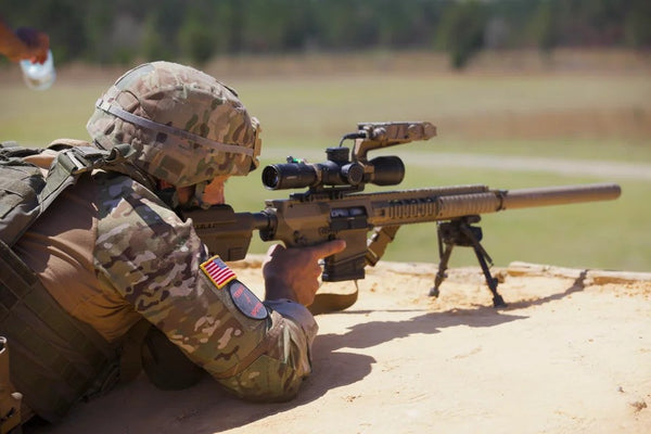 U.S. Army Sniper assigned Colorado National Guard fires his Sniper Rifle