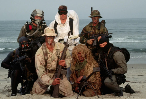 US Navy SEALs operators in the 90s, showcasing their equipment