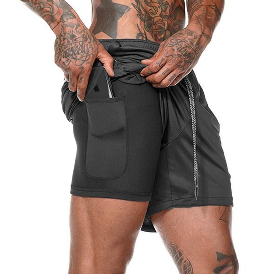 Shorts masculino 2 em 1, perfeito para sua corrida e aquele treino na academia. Secagem rápida, então bora suar!