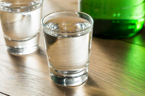 A shot glass of alkaline water