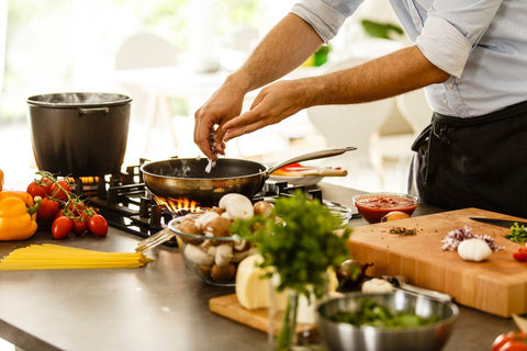 A person cooking in a kitchen