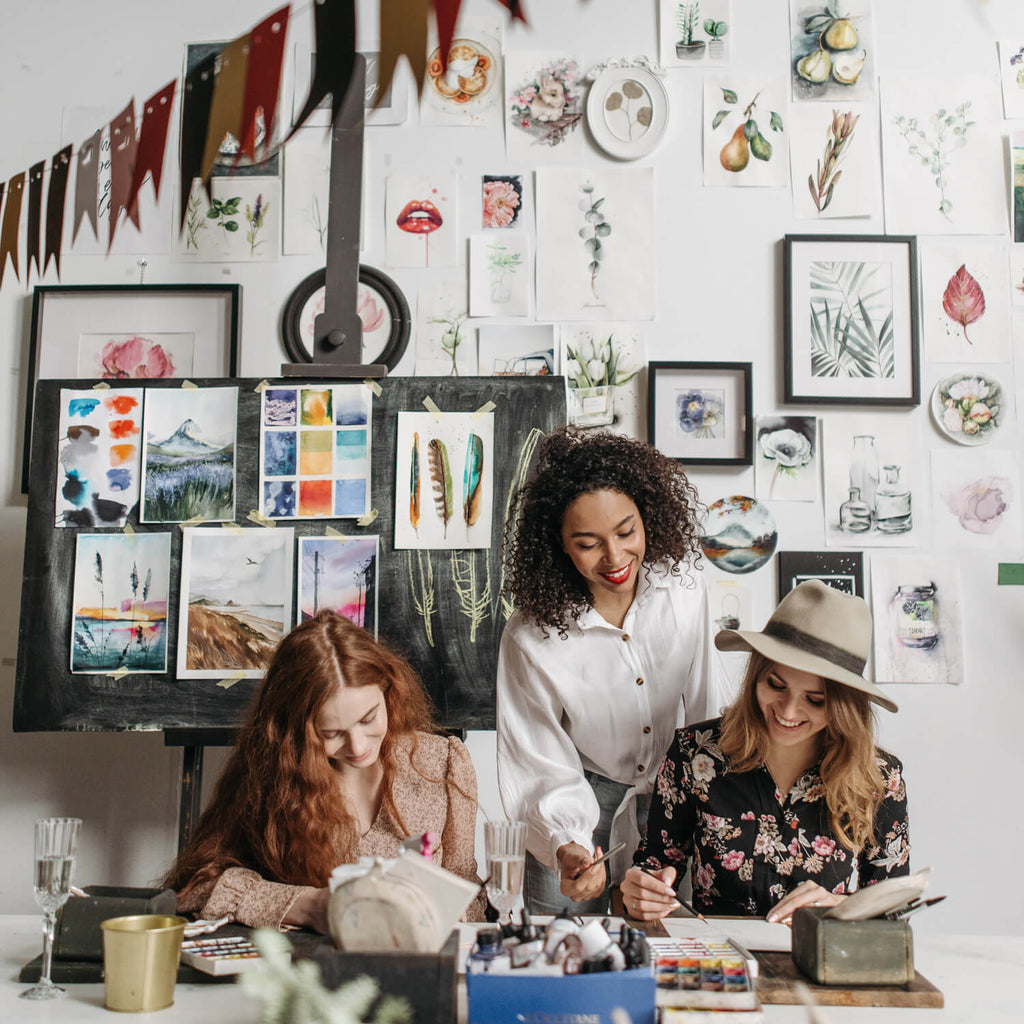 Three girls learning and working together