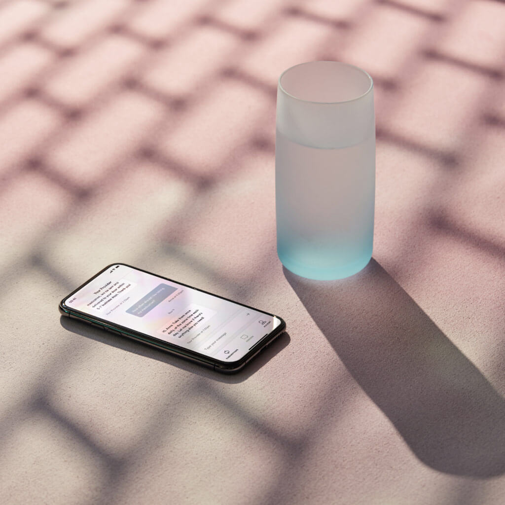 smartphone with glass of water