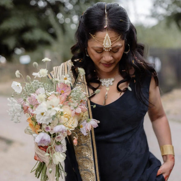 Sabina Motasem in her wedding dress, which she designed herself