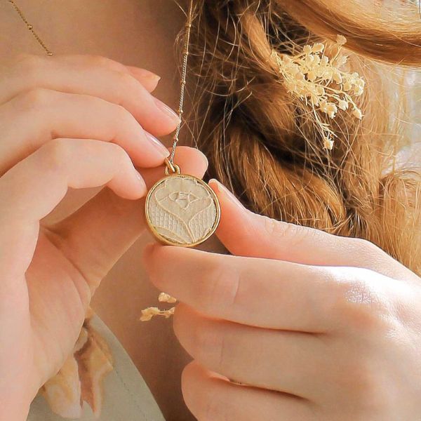 Recycle your wedding dress into a necklace