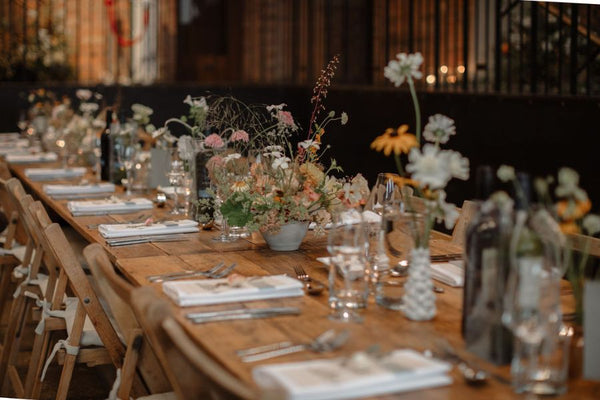 Real bride wedding day tips - image of a wedding day table with flowers set on it