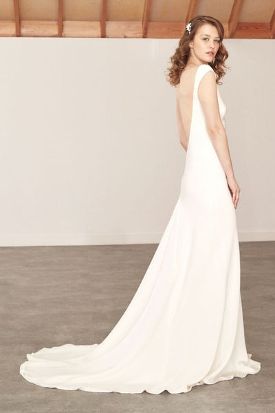 The best wedding dresses for petite brides - bride wearing a Sabina Motasem dress