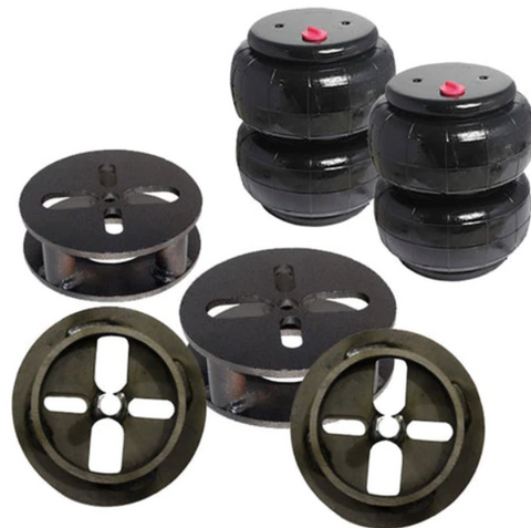 2000-to-2006-toyota-rear-air-suspension-part-4-black-circlular-wheel-pieces-and-2-air-bags-behind-them-on-white-background