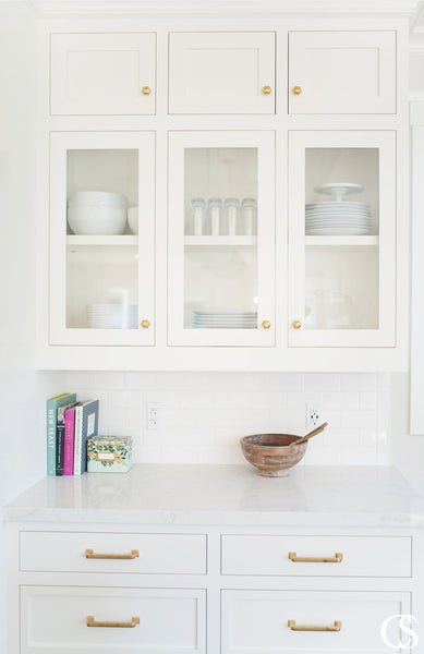 Mixed materials, geometric shapes, eclectic designs, and even traditional and timeless hardware pieces are having quite a moment in cabinetry.