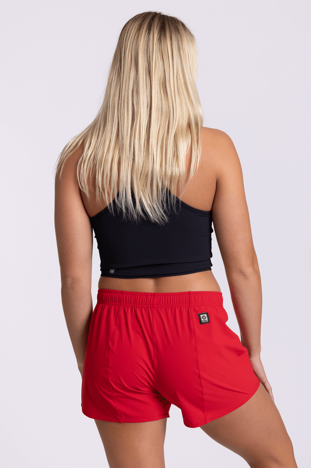 https://cdn.shopify.com/s/files/1/0703/0099/files/Apparel-Shorts_Janie_Solid_Red_Back_HollyMaine_060123_1120x.png?v=1691088187